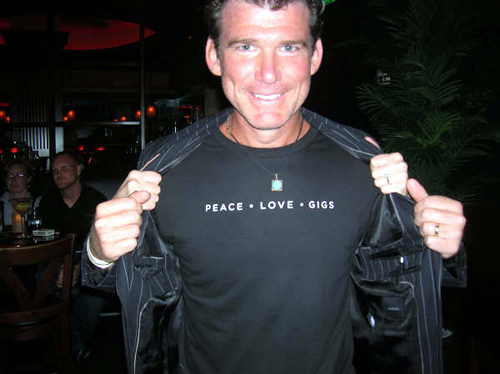 Glenn Reichle as Pierce Brosnan (obviously) sporting his Peace/Love/Gigs Gig Salad shirt Glenn Reichle as Pierce Brosnan (obviously) sporting his Peace/Love/Gigs Gig Salad shirt