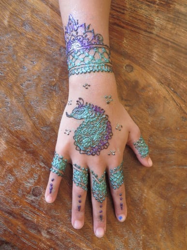 Gallery photo 4 of Glitter Ruby's Henna Art & Typewriter Poetry
