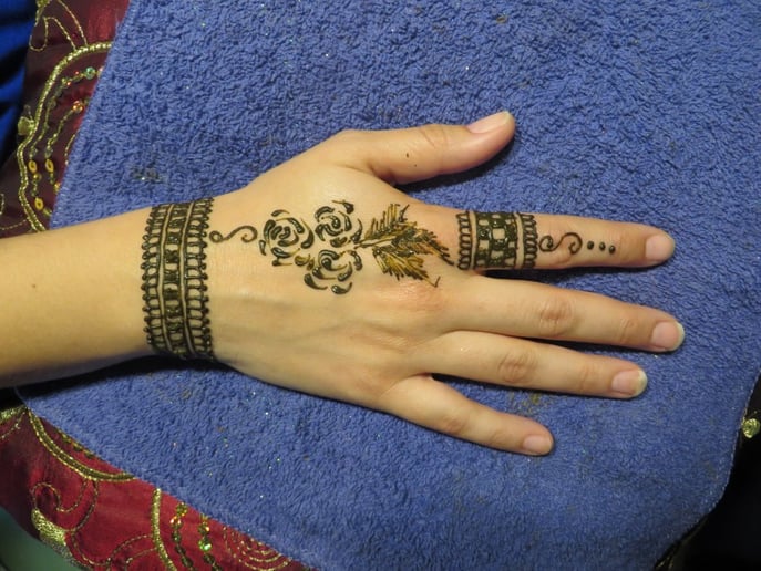 Gallery photo 6 of Glitter Ruby's Henna Art & Typewriter Poetry