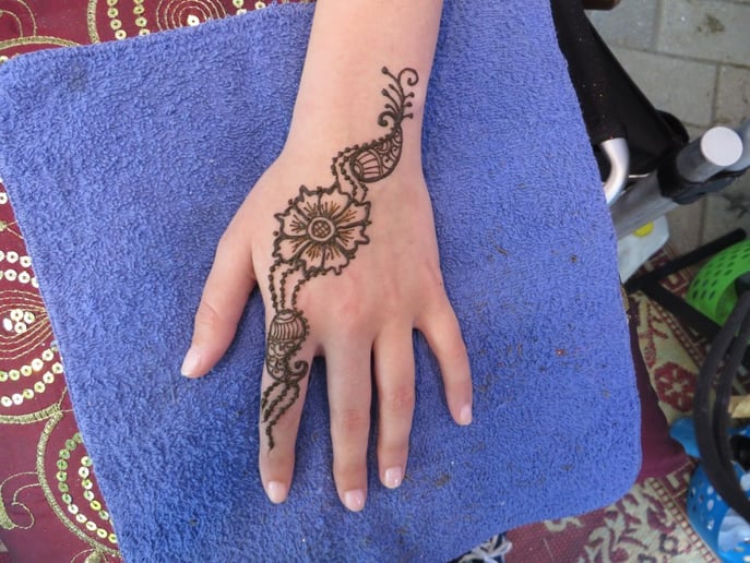 Gallery photo 7 of Glitter Ruby's Henna Art & Typewriter Poetry