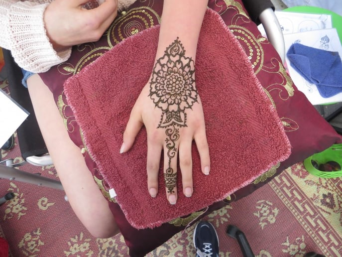 Gallery photo 8 of Glitter Ruby's Henna Art & Typewriter Poetry