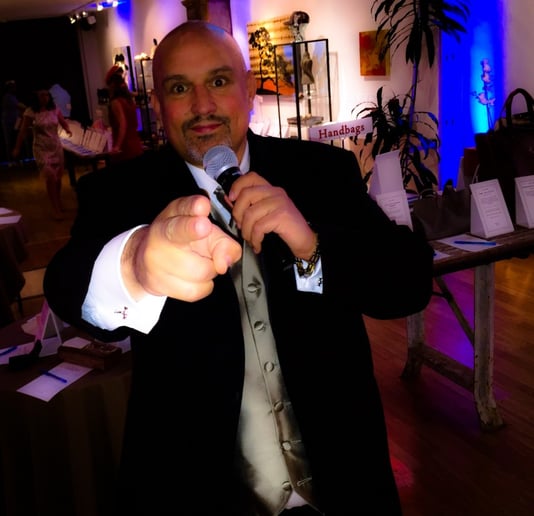 Gallery photo 1 of Benefit Auctioneer