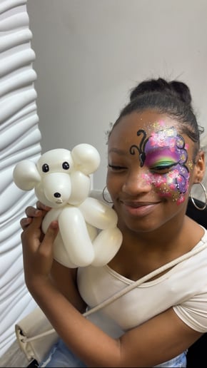 Gallery photo 1 of Cheek to Cheek Face Painting & Balloons