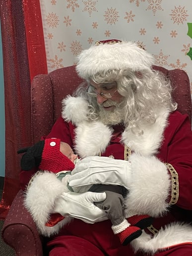 Gallery photo 1 of Coach Santa