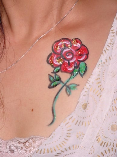 Gallery photo 8 of Face Painting, Glitter Tattoos, and Hair Art by Diana