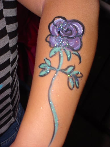 Gallery photo 9 of Face Painting, Glitter Tattoos, and Hair Art by Diana