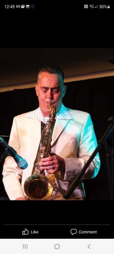 Gallery photo 3 of The Saxman