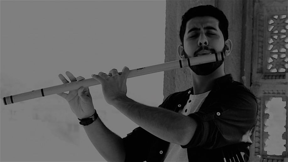Gallery photo 1 of Indian Flute Player