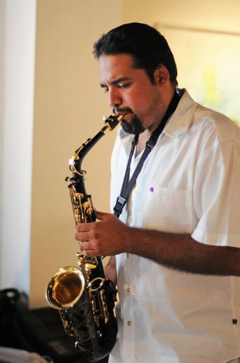 Gallery photo 1 of One Man Band Saxophone Player