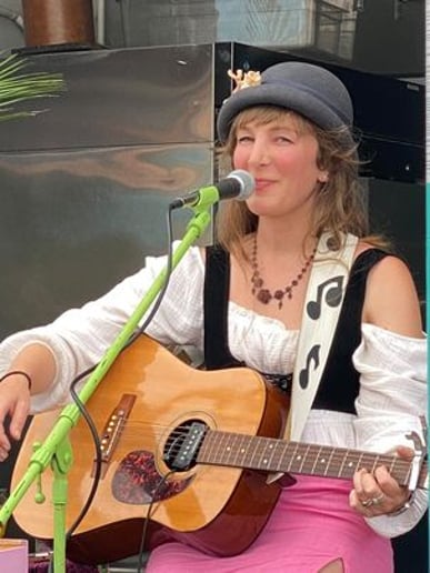 Gallery photo 12 of Junebug Bayer Singing Guitar Player