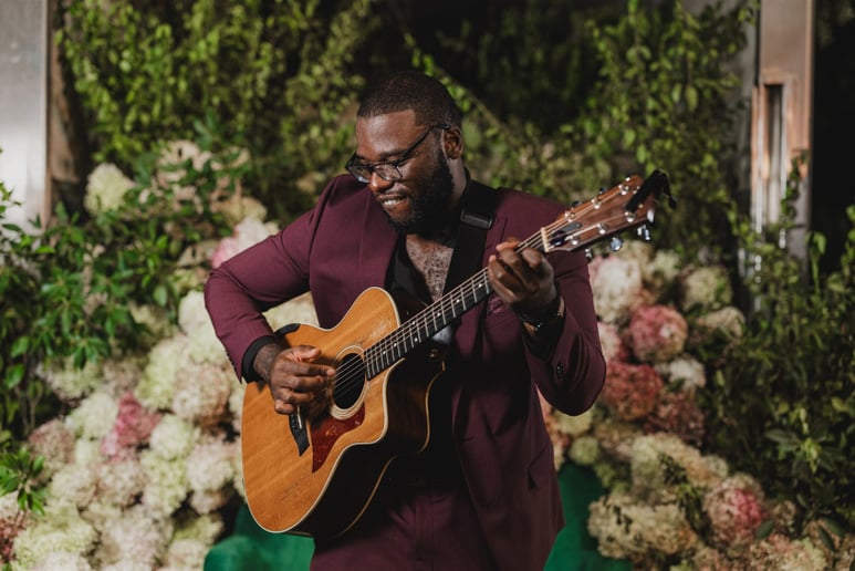 Gallery photo 1 of Rudy Lafrance: Interactive Roaming Wedding Guitarist