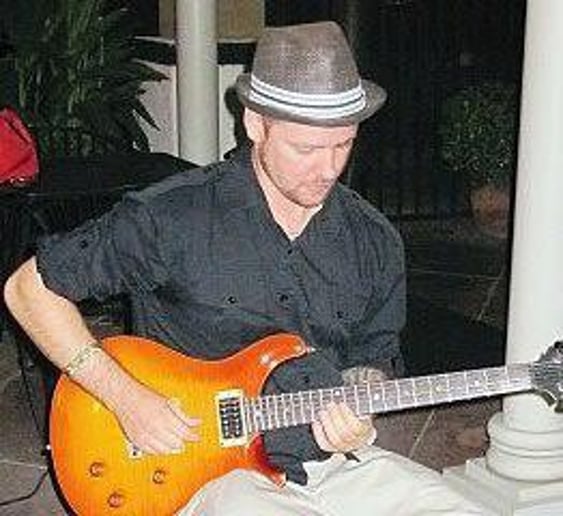 Gallery photo 2 of Latin - Jazz - Blues Guitarist Greg Russell