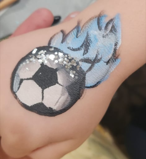 Gallery photo 6 of Luminous Face Paints!