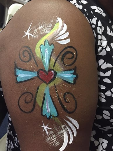Gallery photo 4 of Merry Heart Entertainment: Face Painting, Glitter Tattoos, Balloon Art