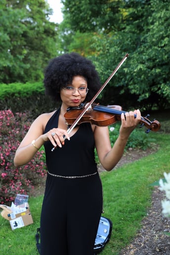 Gallery photo 1 of Black Violin Girl