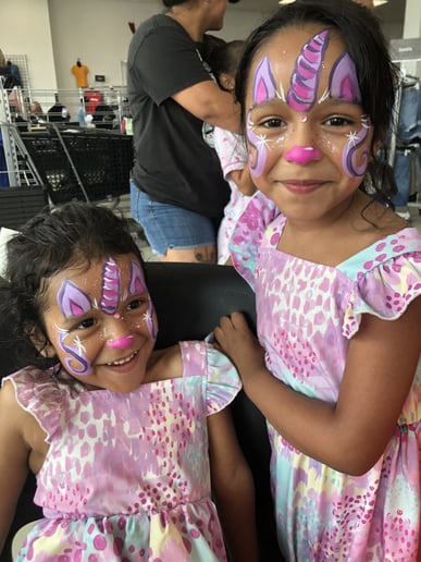 Gallery photo 1 of Rainbow Rose Face Painting