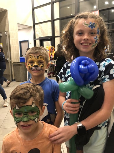 Gallery photo 7 of Rainbow Rose Face Painting