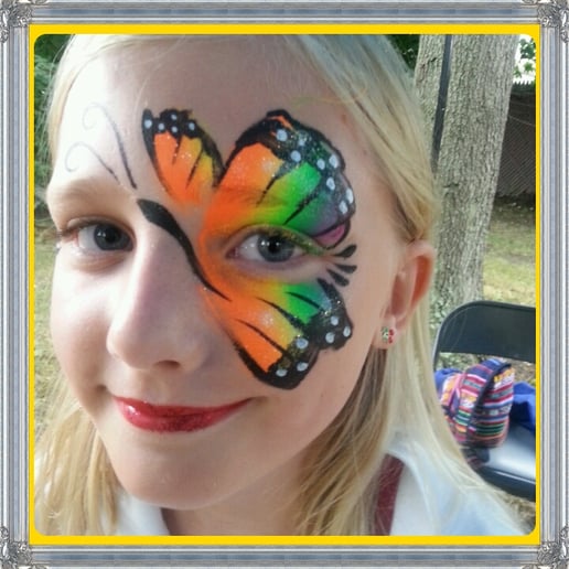 Gallery photo 2 of Rainbow Rosie Professional Face Painting