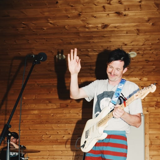 Gallery photo 1 of Rex Plays Guitar