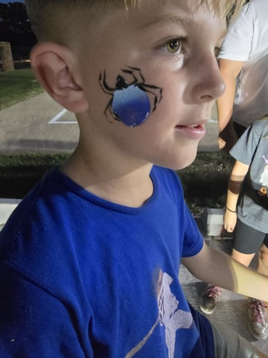 Gallery photo 1 of Shimmer and Smiles Face Painting