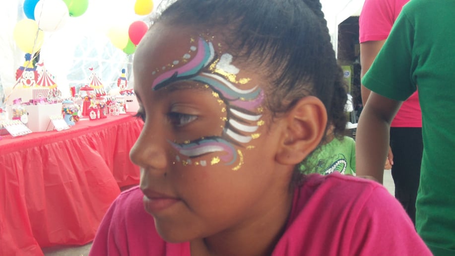 Gallery photo 2 of Silver Stardust Face Painting