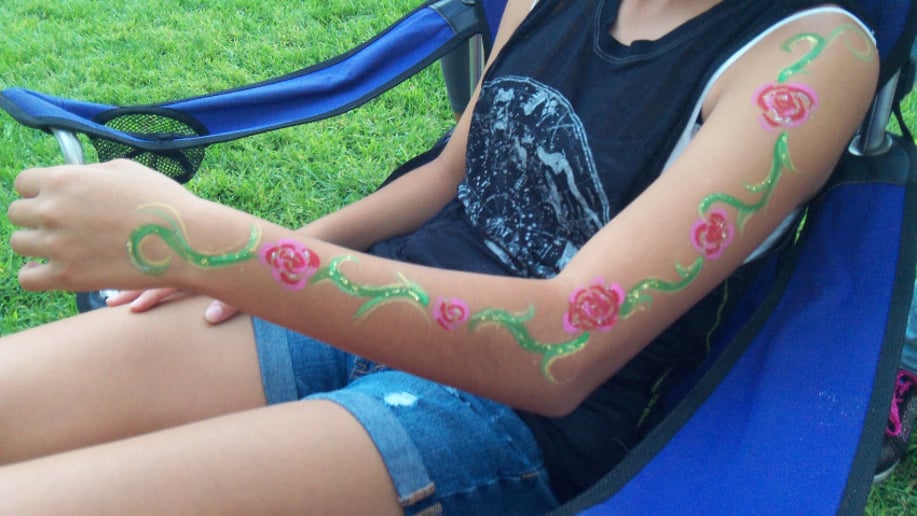 Gallery photo 3 of Silver Stardust Face Painting