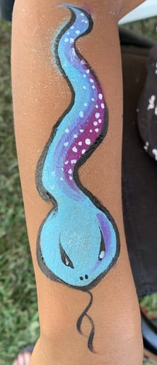 Gallery photo 7 of Swirls and Curls Face Painting