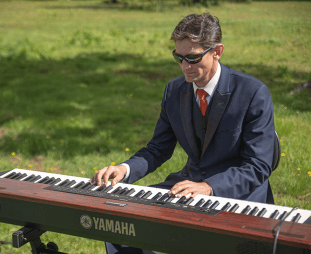 Gallery photo 2 of The Piano Gentleman