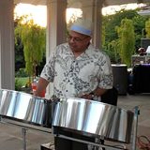 Gallery photo 1 of The Spiceislander Steeldrummer