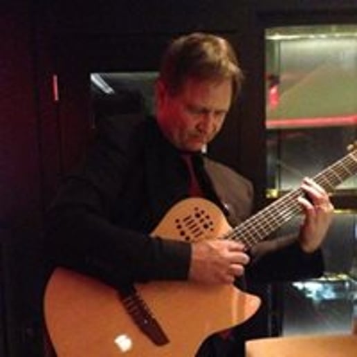 Gallery photo 2 of Timothy Price Fingerstyle Guitarist