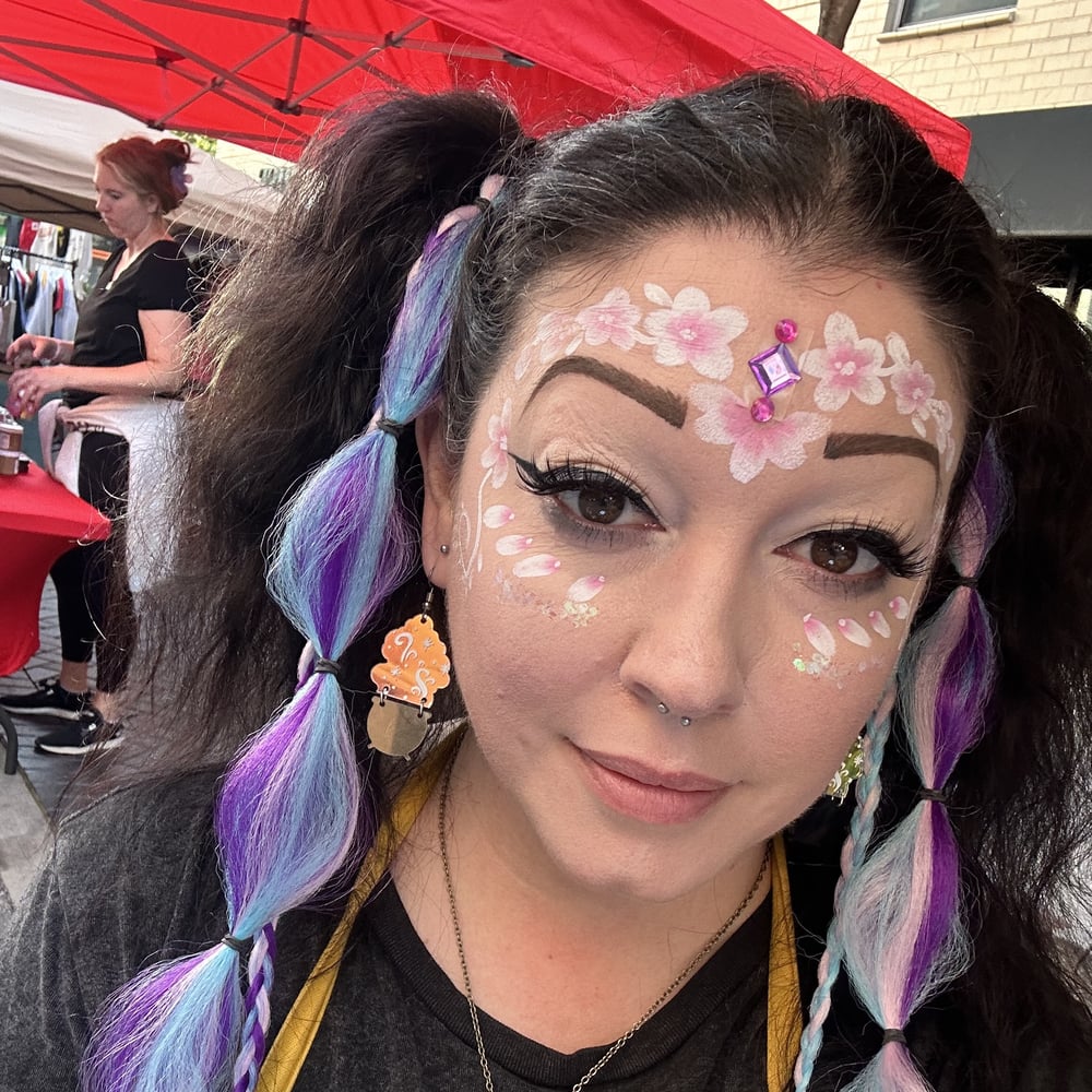 Profile thumbnail image for Face Painting and Hair Tinsel by Renee