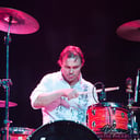 Gene Hits Drums Hard