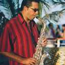 One Man Band Saxophone Player