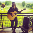 Denise Forney, singing guitarist