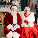 Santa Phil, Mrs Claus and their Magic Tesla
