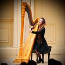 Singing harpist