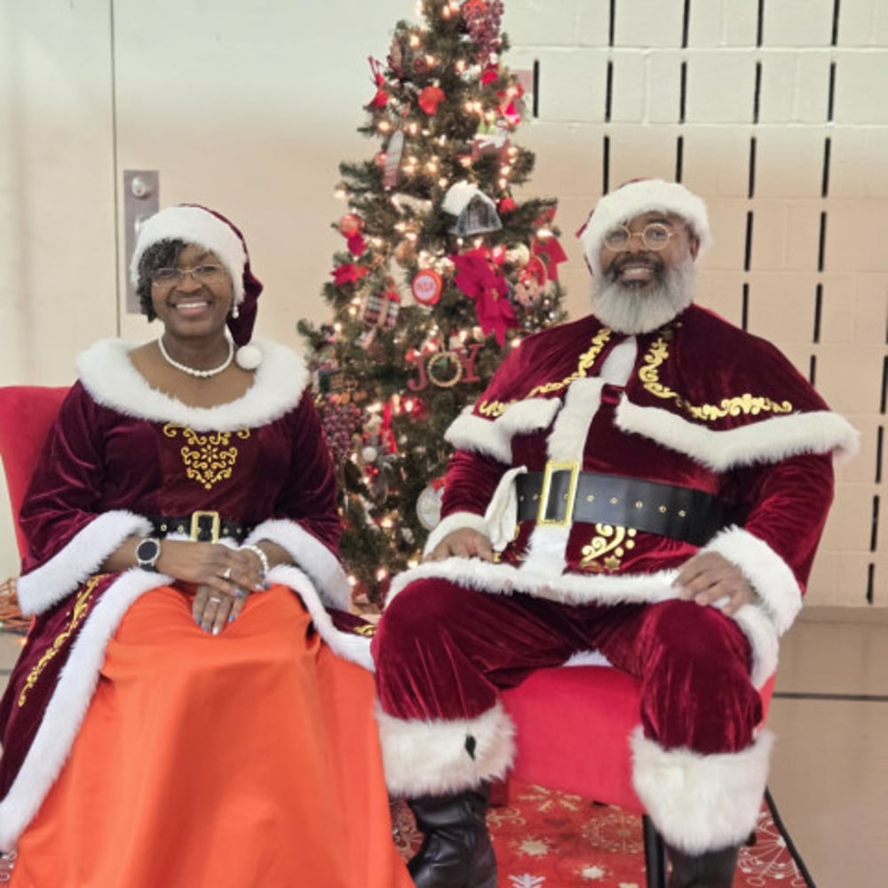 Profile thumbnail image for Black Santa Robert and Mrs. Claus