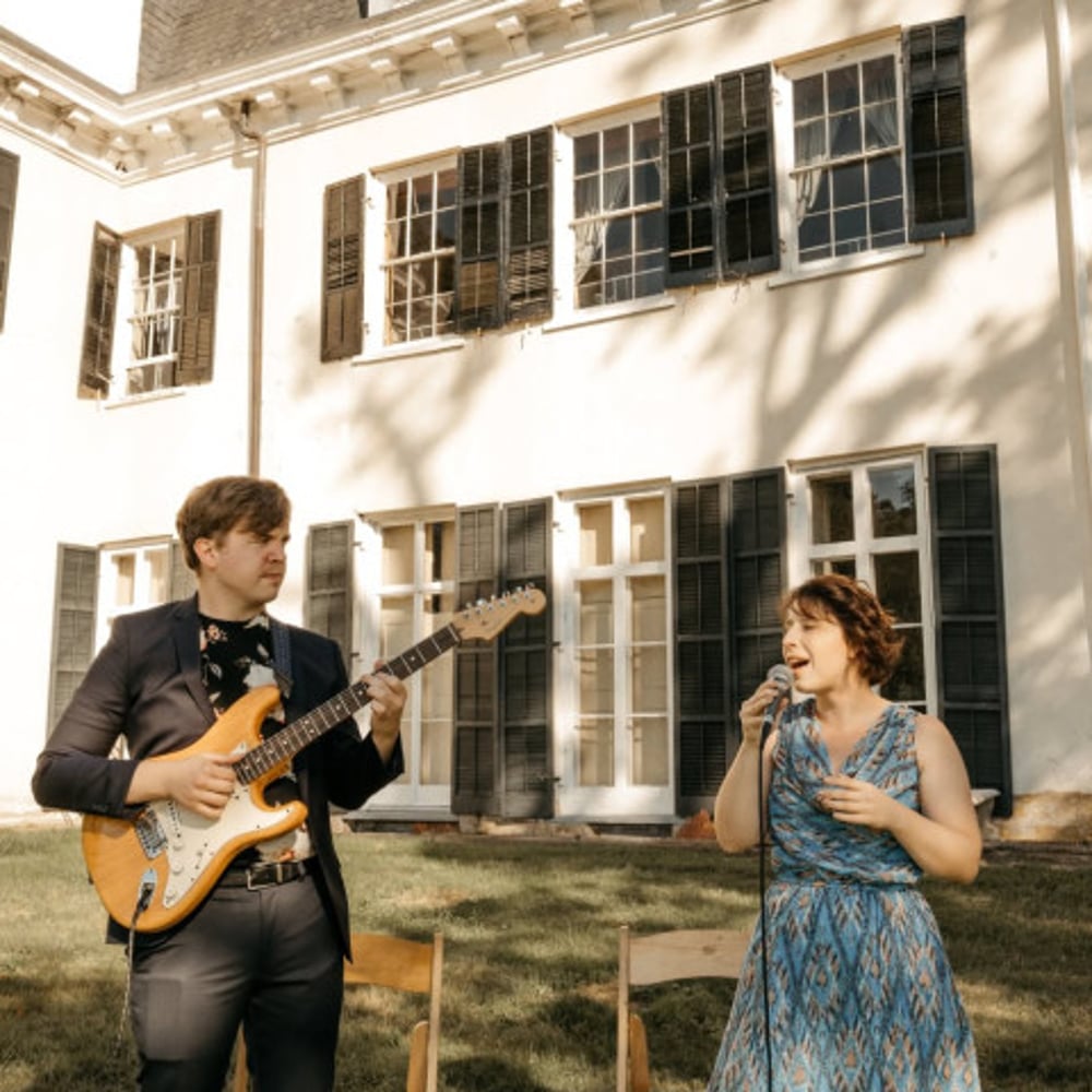 Profile thumbnail image for Mort & Mim — Jazz Guitar & Voice Duo