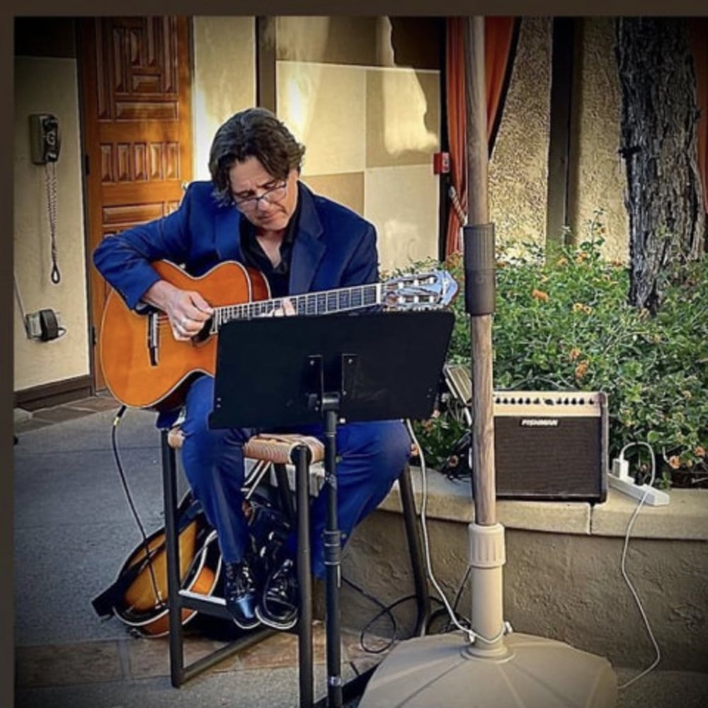 Profile thumbnail image for Troy Dexter - solo guitarist