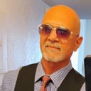 Robert J Baron