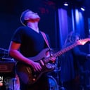 Slick Guitar Player