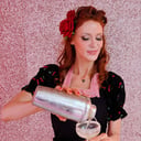 The Redhead with a Shaker