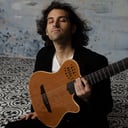 Your favorite songs on an elegant guitar